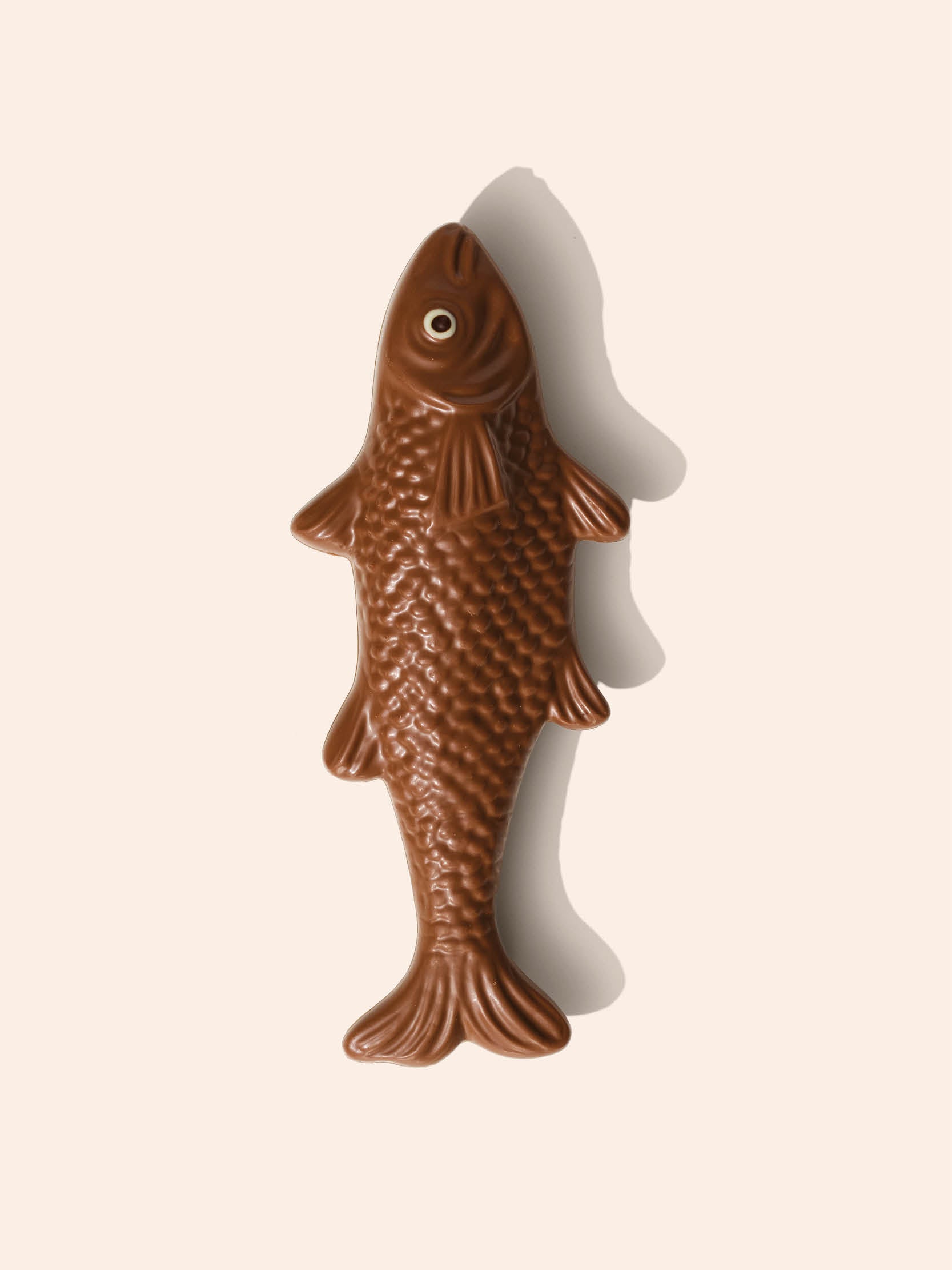 A large, hollow milk chocolate in the shape of a fish