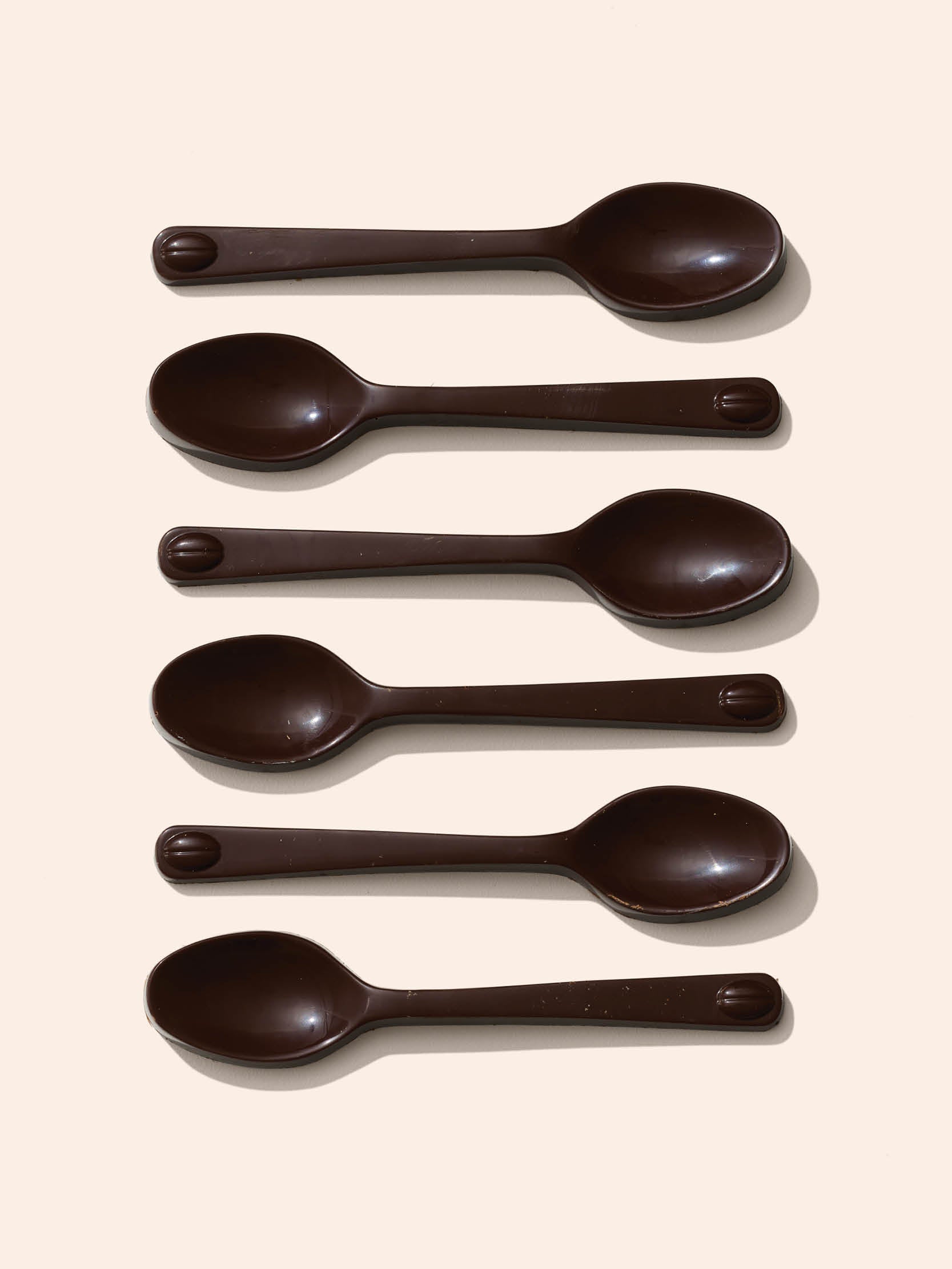 A collection of twelve dark chocolate spoons.