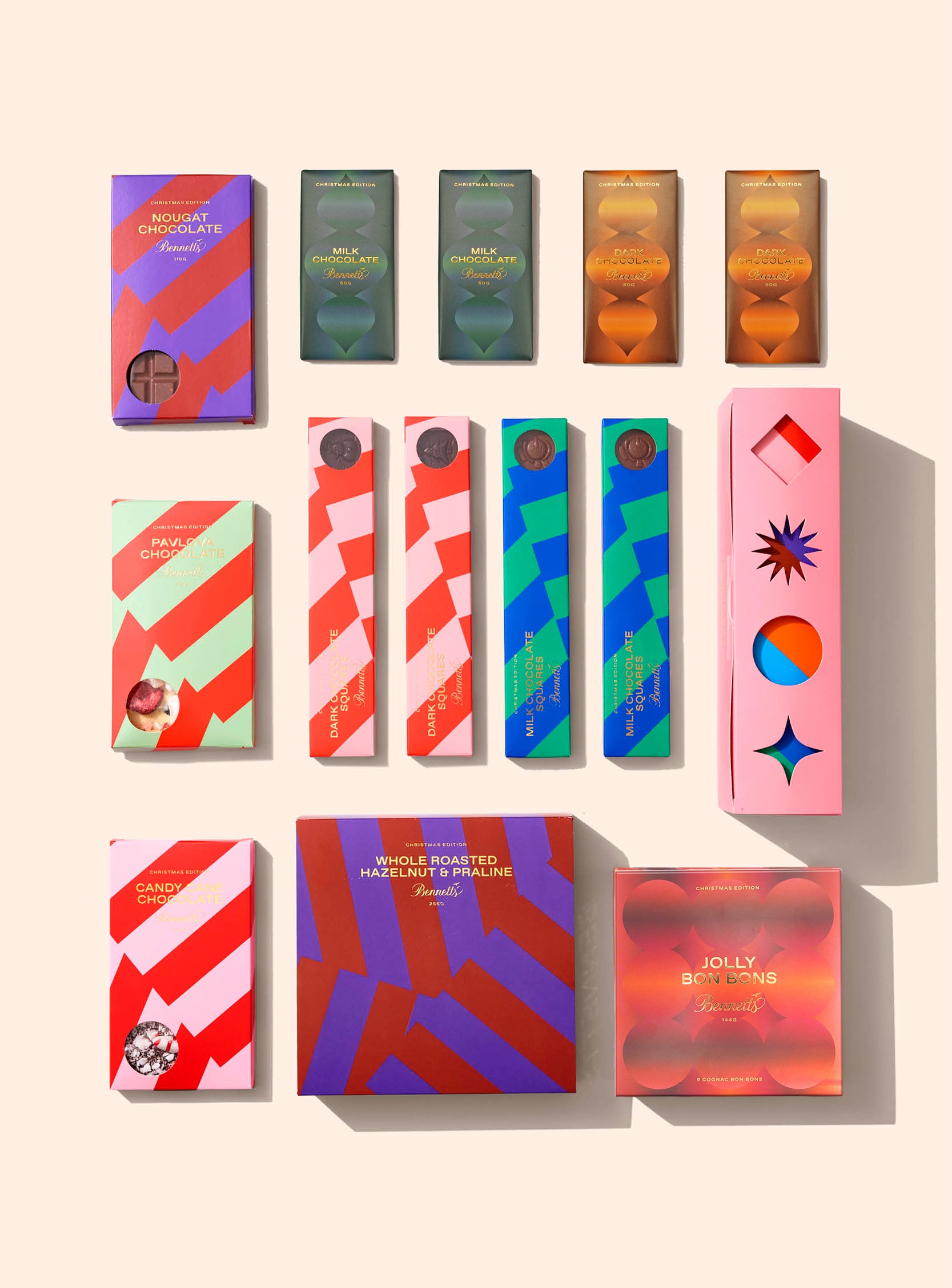 Bennetts Christmas chocolate hamper featuring assorted limited-edition, festive confections, Christmas specialty bars, and artisanal gift boxes in colourful modern packaging – luxury handmade chocolates from Mangawhai, New Zealand.